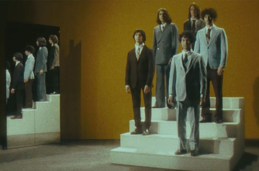 The Strokes standing lifeless for the 'Bad Decisions' music video